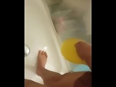 Pissing in a condom in the shower video on WebcamWhoring.com