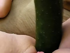 Busty woman plays with cucumber video on WebcamWhoring.com