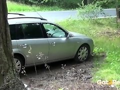 Public Peeing - A hot babe relieves herself next to a parked car video on WebcamWhoring.com