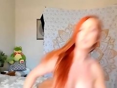Redhead webcam whore playing with strange dildo video on WebcamWhoring.com
