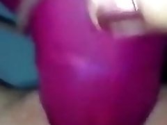 Purple dildo, clit clip and hiss piss video on WebcamWhoring.com