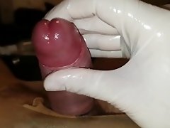 Slow handjob with latex gloves and urethral sounding video on WebcamWhoring.com