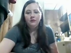 Busty mature in leather skirt fingering her pussy on webcam video on WebcamWhoring.com